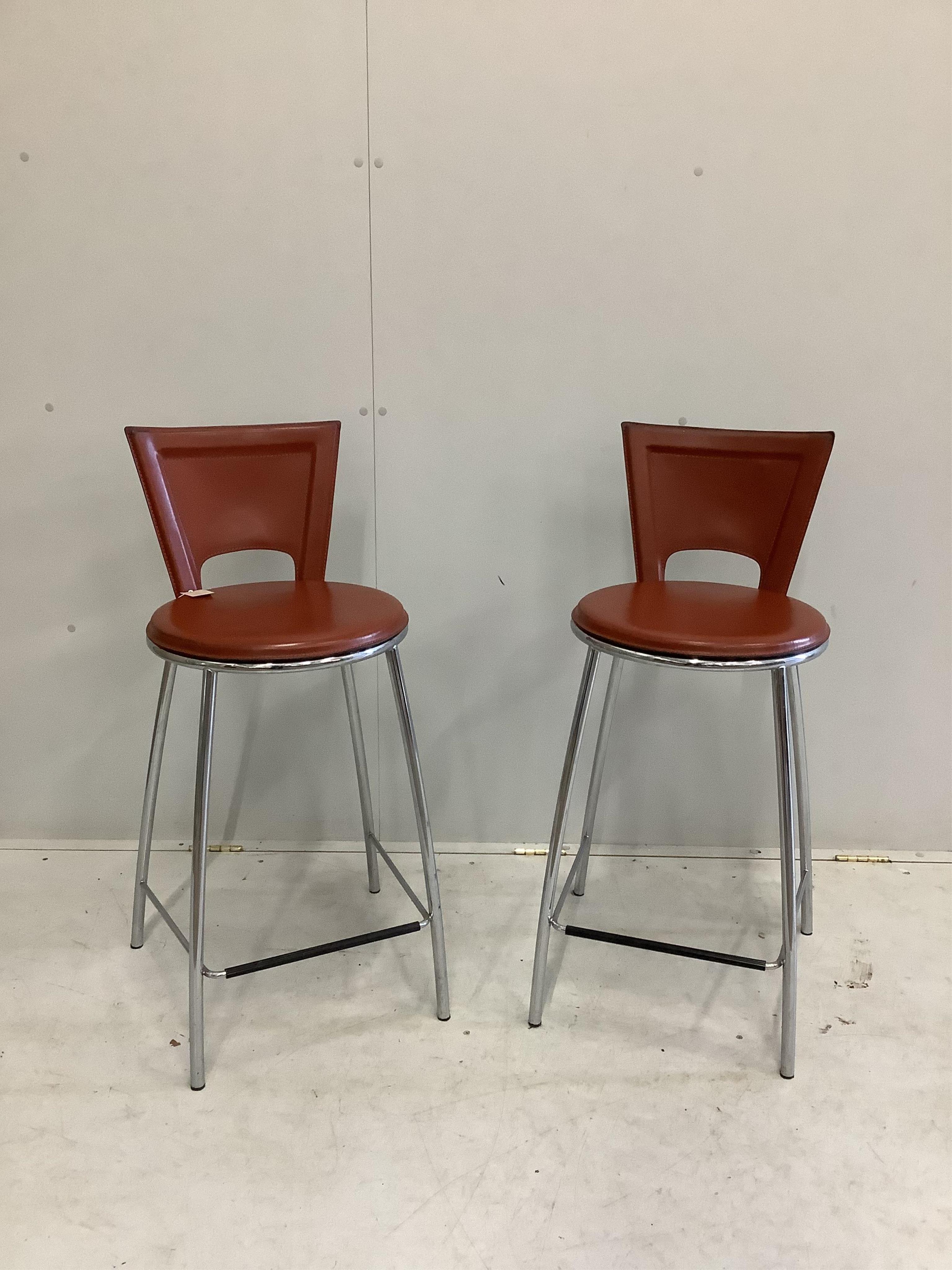 A pair of contemporary bar stools, height 92cm. Condition - fair